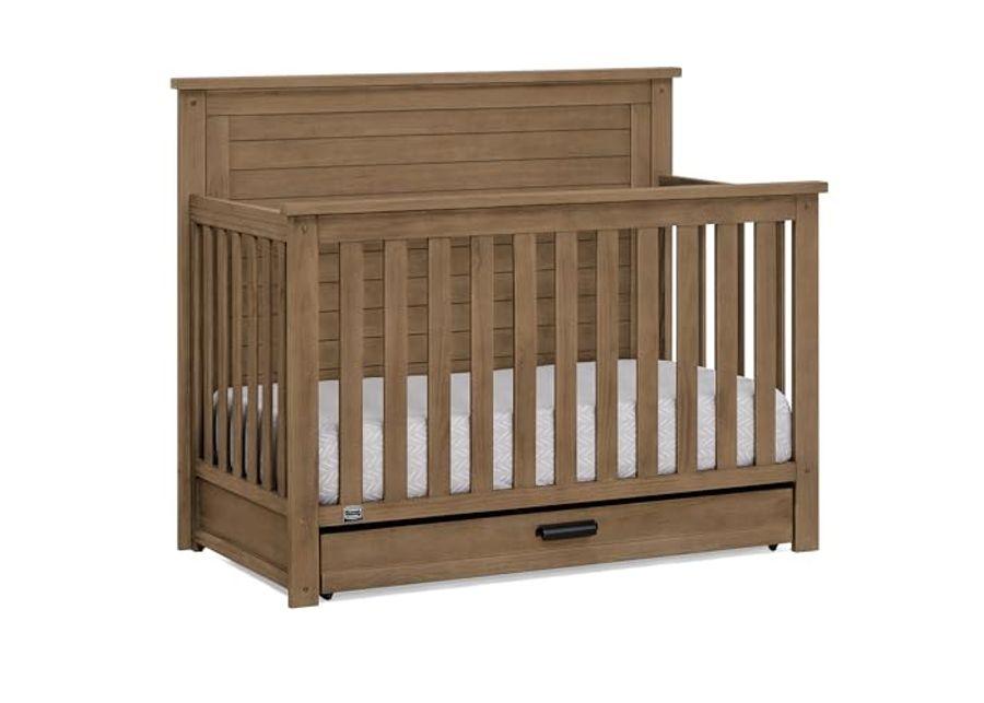 Delta Children Simmons Kids Caden 6-in-1 Convertible Crib with Trundle Drawer, Greenguard Gold Certified, Aged Oak