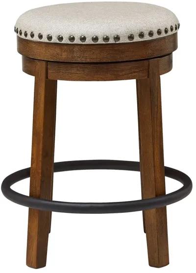 Valebeck - Upholstered Swivel Stool