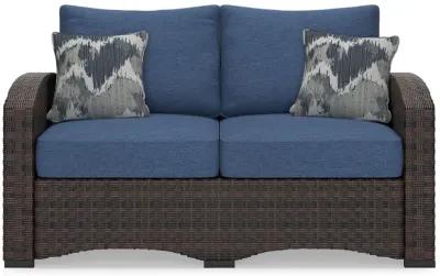 Windglow - Blue / Brown - Loveseat With Cushion