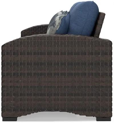 Windglow - Blue / Brown - Loveseat With Cushion