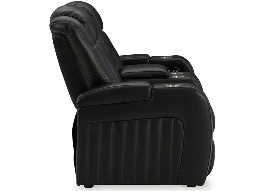 Caveman Den - Midnight - Power Reclining Loveseat With Console/ Adj Hdrst