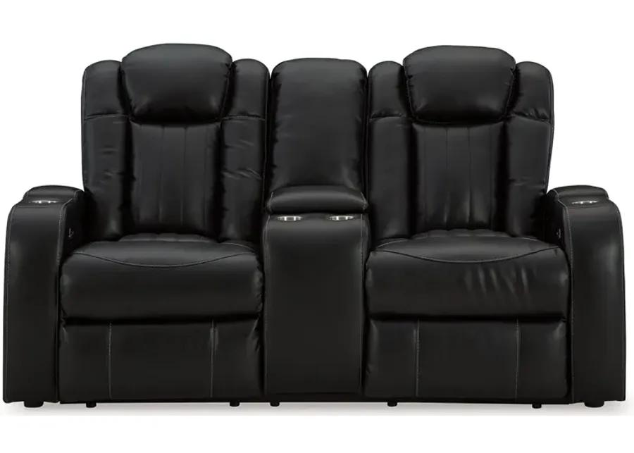 Caveman Den - Midnight - Power Reclining Loveseat With Console/ Adj Hdrst