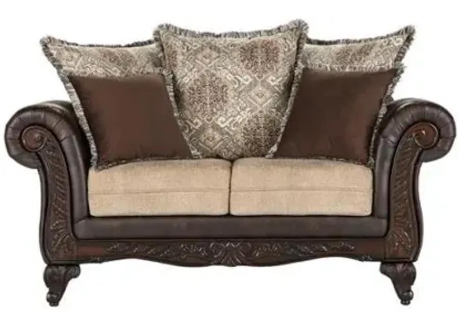 Elmbrook - Upholstered Rolled Arm Loveseat With Intricate Wood Carvings - Brown