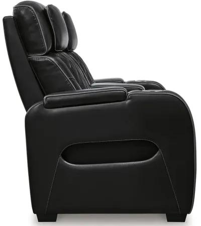 Boyington - Power Reclining Loveseat With Console/Adj Hdrst