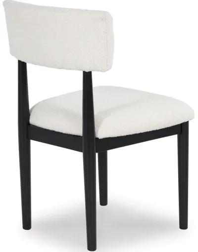 Xandrum - White / Black - 5 Pc. - Round Dining Room Table, 4 Side Chairs