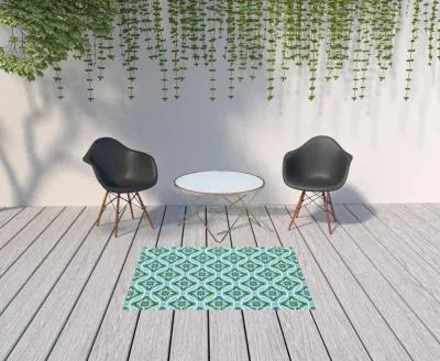 4' X 6' Geometric Stain Resistant Outdoor / Indoor Area Rug - Blue / Green