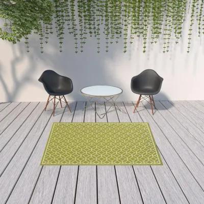 5' X 8' Geometric Stain Resistant Outdoor & Indoor Area Rug - Green / Ivory