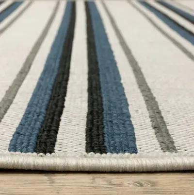 5' X 7' Geometric Stain Resistant Indoor & Outdoor Area Rug - Blue / Beige