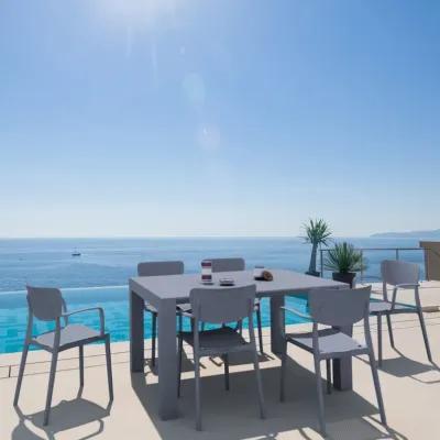 Compamia Loft Outdoor Dining Set with 6 Arm Chairs & 55 Inch Extension Table Dark Gray