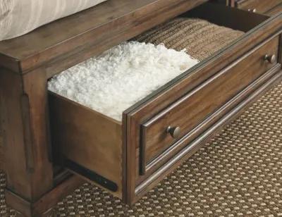 Flynnter Medium Brown King Panel Bed with Storage