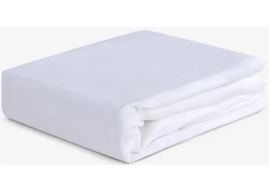 BRIGHT WHITE HYPER-LINEN PERFORMANCE CRIB SHEET