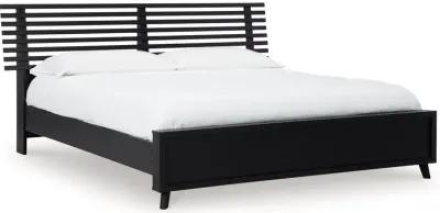 Danziar King Slat Panel Bed with Framed Panel Footboard