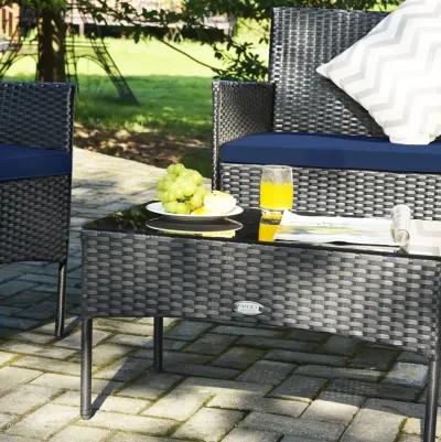 4 Pieces Patio Rattan Cushioned Sofa Set with Tempered Glass Coffee Table-Navy