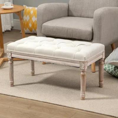 Beige Vintage Seat: 15.75" Tufted Ottoman with Distressed Wood Legs