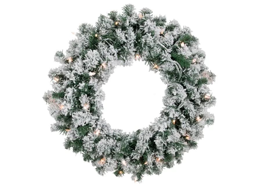 Pre-Lit Flocked Snow White Artificial Christmas Wreath  24-Inch  Clear Lights