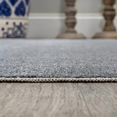 Twyla Classic Solid Low-Pile Machine-Washable Blue. Area Rug