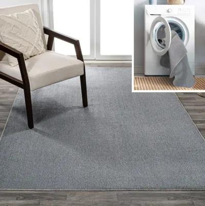 Twyla Classic Solid Low-Pile Machine-Washable Blue. Area Rug