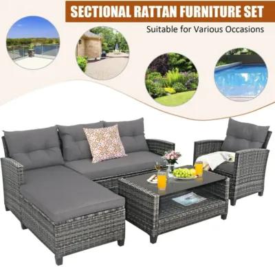 Hivvago 4 Pieces Patio Rattan Furniture Set with Cushion and Table Shelf