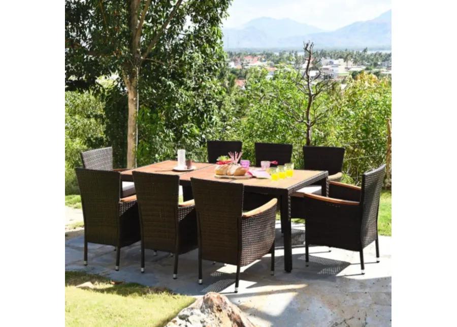 9 Pieces Patio Rattan Dining Set with Stackable Chairs Cushioned and Acacia Wood Table Top