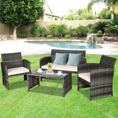 Hivvago 4 Pieces Patio Rattan Furniture Set with Glass Table and Loveseat