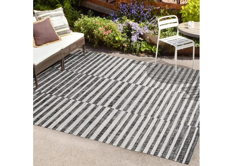 Sukie Modern Offset Stripe Indoor/Outdoor Area Rug