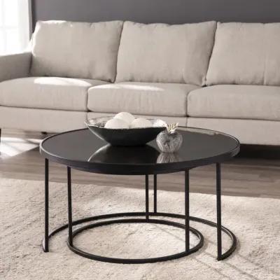 Homezia Set of Two Black And Silver Mirrored Round Nested Coffee Table Set