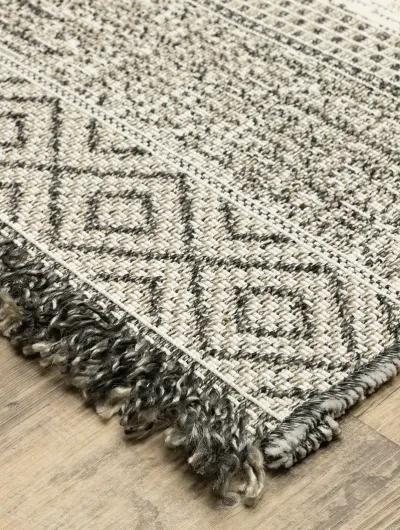 Gillian 9'10" x 12'10" Beige Rug