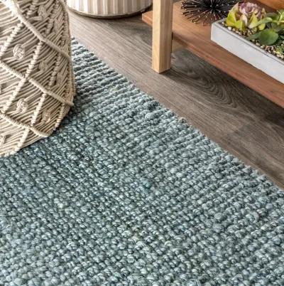 Pata Hand Woven Chunky Jute with Fringe Area Rug