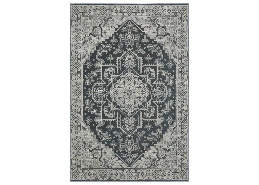 Intrigue 6'7" x 9'6" Blue Rug