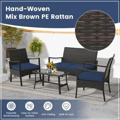 4 Pieces Outdoor Rattan Conversation Set with Tempered Glass Coffee Table