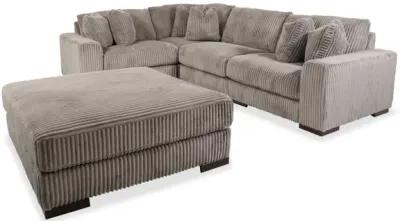 Lindyn Four-Piece Sectional and Ottoman Set