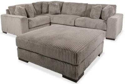 Lindyn Four-Piece Sectional and Ottoman Set