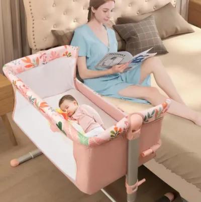 Folding Baby Bassinet Bedside Sleeper with 4 Adjustable Heights-Pink