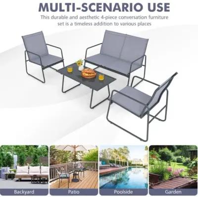 Hivvago 4 Pieces of Metal Patio Furniture Chat Set with Tempered Glass Coffee Table