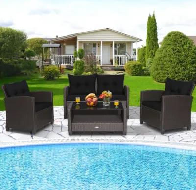 Hivvago 4 Pieces Patio Rattan Furniture Set with Tempered Glass Coffee Table