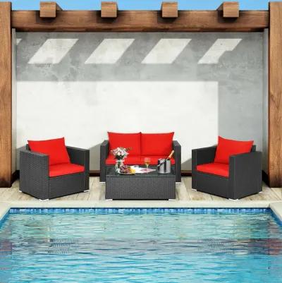 4 Pieces Patio Rattan Conversation Set with Padded Cushion and Tempered Glass Coffee Table