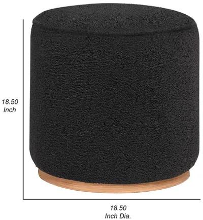 Zia 19 Inch Ottoman, Black Faux Sheepskin Upholstery, Round Platform Base - Benzara