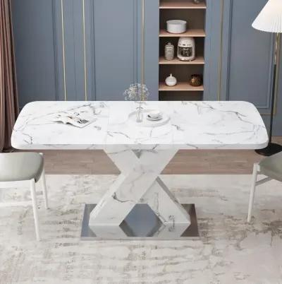 White marble dining table with X-shaped metal legs