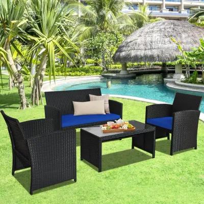 4 Pieces Rattan Patio Furniture Set with Weather Resistant Cushions and Tempered Glass Tabletop