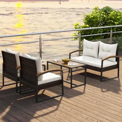 4 Pieces Patio Conversation Set with Acacia Wood Armrests and Tabletop and Cushions-White