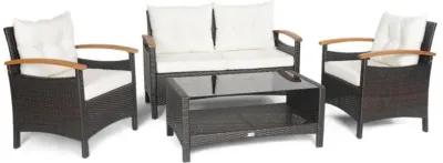 Hivvago 4 Pieces Patio Rattan Furniture Set with Cushioned Sofa and Storage Table