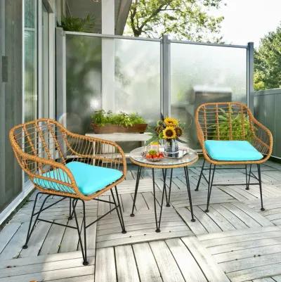 3 Pieces Rattan Furniture Set with Cushioned Chair Table