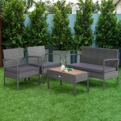 Hivvago 4 Pieces Rattan Patio Conversation Furniture Set with Acacia Wood Tabletop