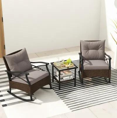 3-Piece Outdoor Rattan Rocking Chairs Set with 2-Tier Side Table for Garden and Backyard