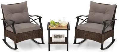 3-Piece Outdoor Rattan Rocking Chairs Set with 2-Tier Side Table for Garden and Backyard