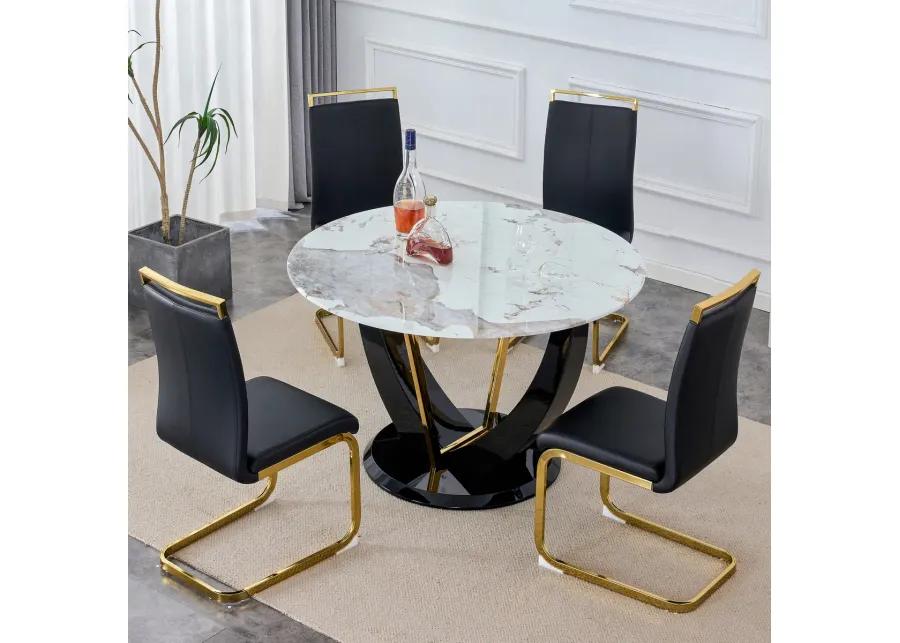 Table and chair set. 1 table and 4 chairs. Round Pandora style stone burning tabletop with black MDF legs. Paired with 4 chairs with PU black cushions and golden legs.908 1162