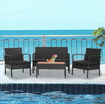 Hivvago 4 Pieces Patio Rattan Cushioned Furniture Set with Wooden Tabletop