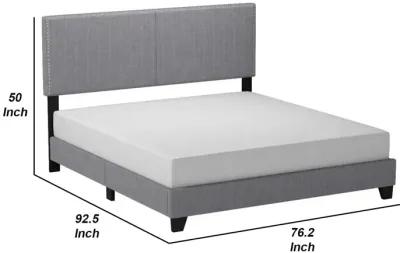 California King Bed with Padded Headboard and Nailhead Trim, Gray-Benzara