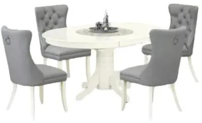 5 Piece Dining Set Contains an Oval Kitchen Table with Butterfly Leaf