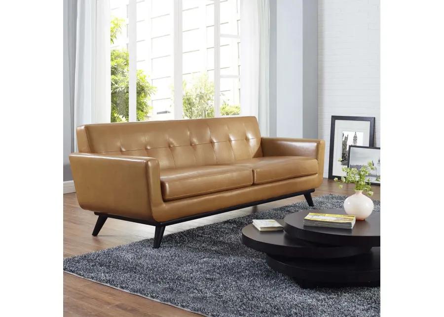 Engage Leather Sofa - Ultimate Lounging Experience with Curves, Dual Cushions, and Cherry Wood Legs. Perfect for Relaxation, Coffee Time, and Lively Conversations. Includes 7 Eye-Catching Buttons.